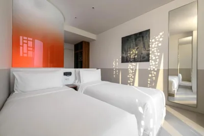 Twin-Zimmer mit Stadtblick — Wink Saigon Centre, Unscripted by Hyatt - 24-Hour Stays